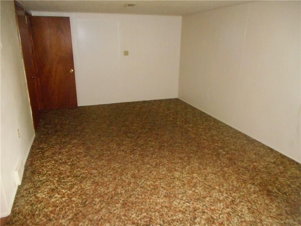 10155 Pearl Road Penn Hills, PA 15235 - Photo 15 of 21 LIVING ROOM IN LOWER FLOOR APARTMENT