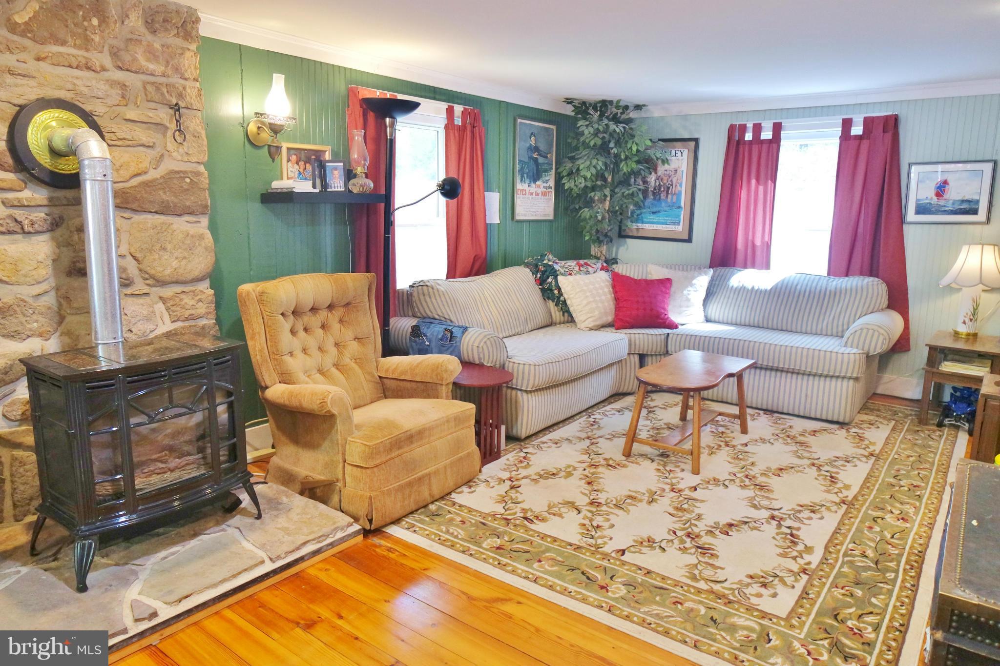 974 North Maple Road Mount Jackson, VA 22842 - Photo 16 of 30 a living room with furniture and a flat screen tv