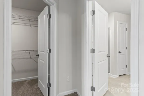 a view of bathroom with a glass shower door