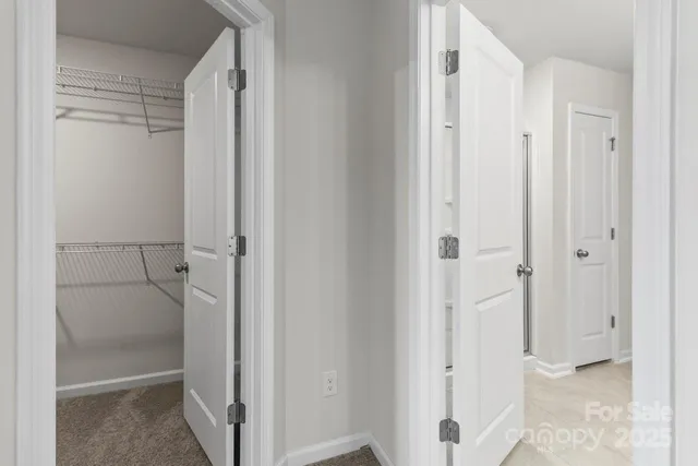 a view of bathroom with a glass shower door