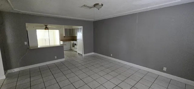 a view of an empty room with window