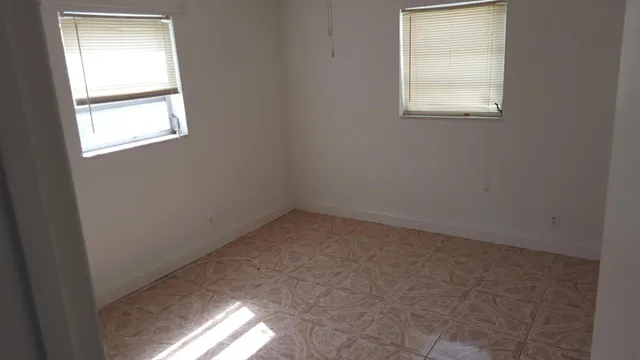 an empty room with a window