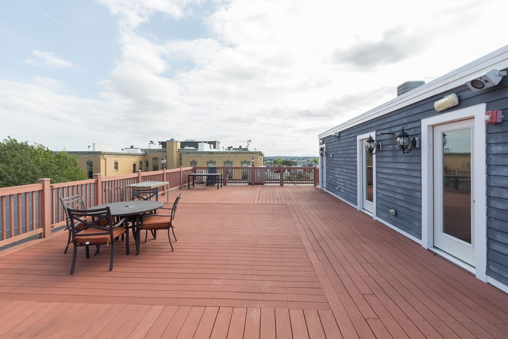 345 West Broadway, Unit 4 Boston, MA 02127 - Photo 22 of 26 a view of a terrace with chairs