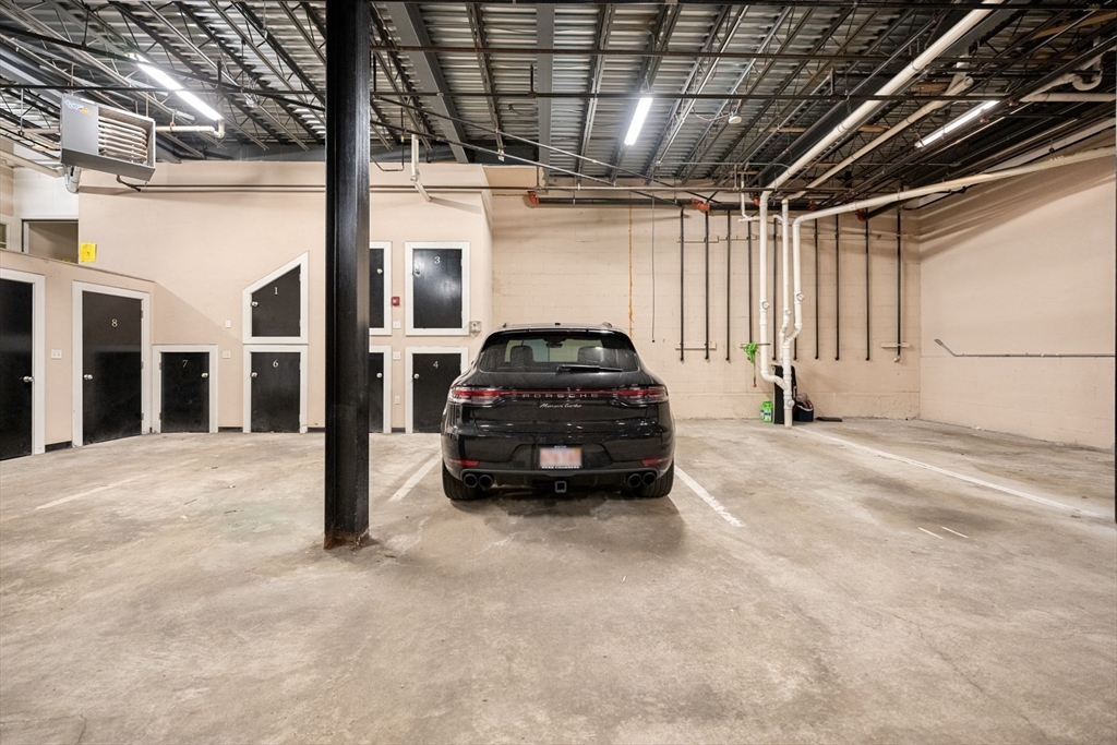 345 West Broadway, Unit 4 Boston, MA 02127 - Photo 24 of 26 a car parked in parking garage