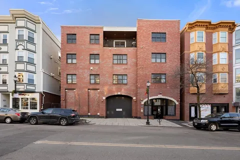 a car parked in front of a building