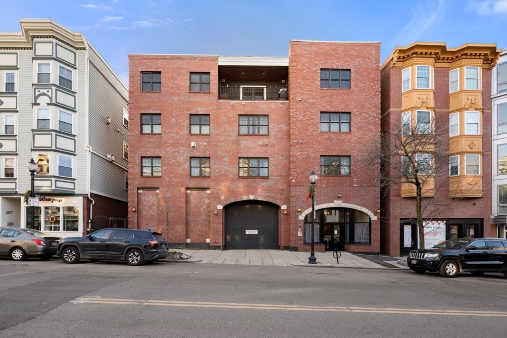 345 West Broadway, Unit 4 Boston, MA 02127 - Photo 25 of 26 a car parked in front of a building