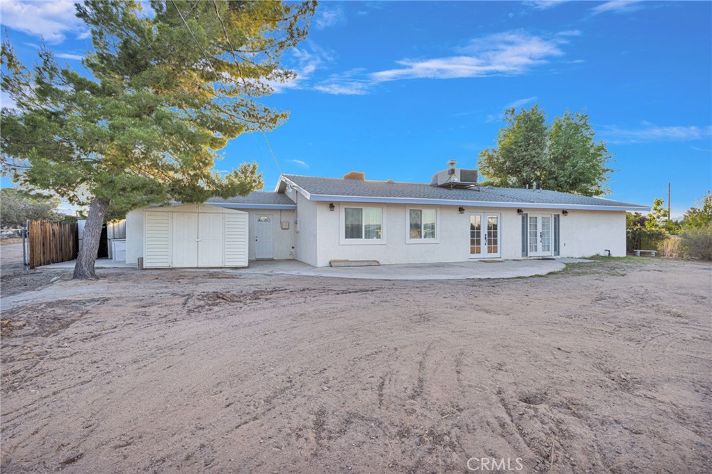 15177 Mendota Road North Apple Valley, CA 92307 - Photo 36 of 50 front view of a house with a yard