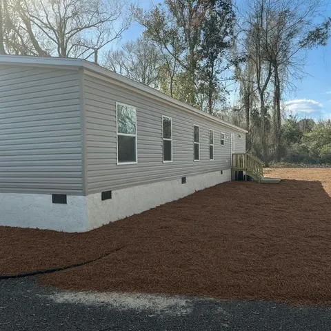 a view of outdoor space and yard