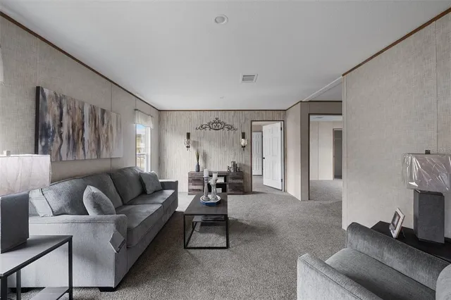 a living room with furniture and a couch