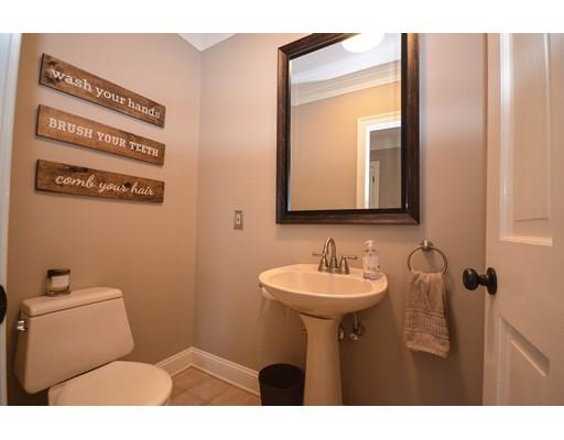 122 Armsby Road Sutton, MA 01590 - Photo 13 of 30 a bathroom with a sink mirror and toilet