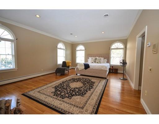 122 Armsby Road Sutton, MA 01590 - Photo 14 of 30 a living room with a couch and a coffee table