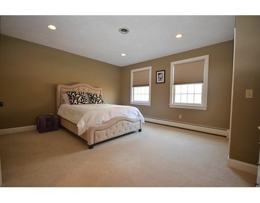 122 Armsby Road Sutton, MA 01590 - Photo 25 of 30 a bedroom with a bed and a window