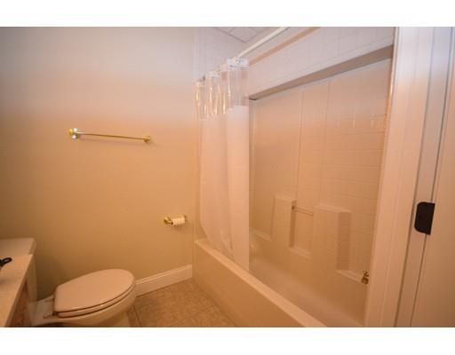 122 Armsby Road Sutton, MA 01590 - Photo 27 of 30 a bathroom with a toilet and a shower