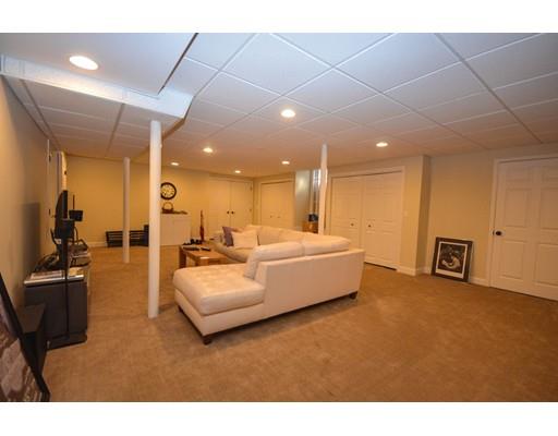 122 Armsby Road Sutton, MA 01590 - Photo 28 of 30 a living room with furniture and a flat screen tv