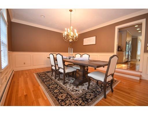 122 Armsby Road Sutton, MA 01590 - Photo 3 of 30 a dining room with furniture and chandelier