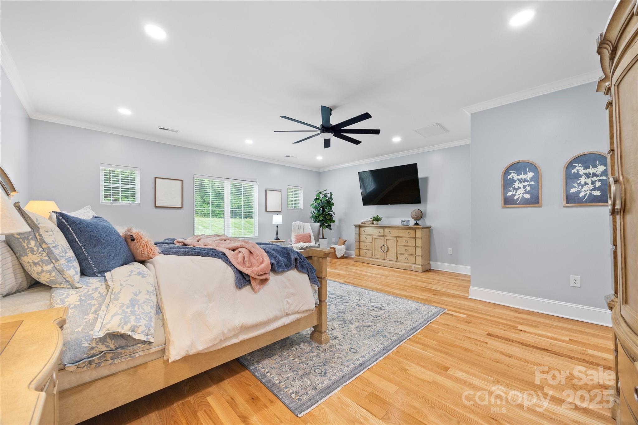 184 Quiet Cove Road Mooresville, NC 28117 - Photo 12 of 45 a living room with furniture and a flat screen tv