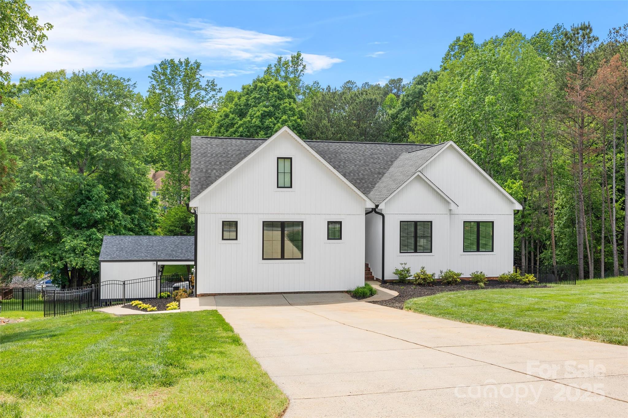 184 Quiet Cove Road Mooresville, NC 28117 - Photo 2 of 45 a front view of house with yard and green space