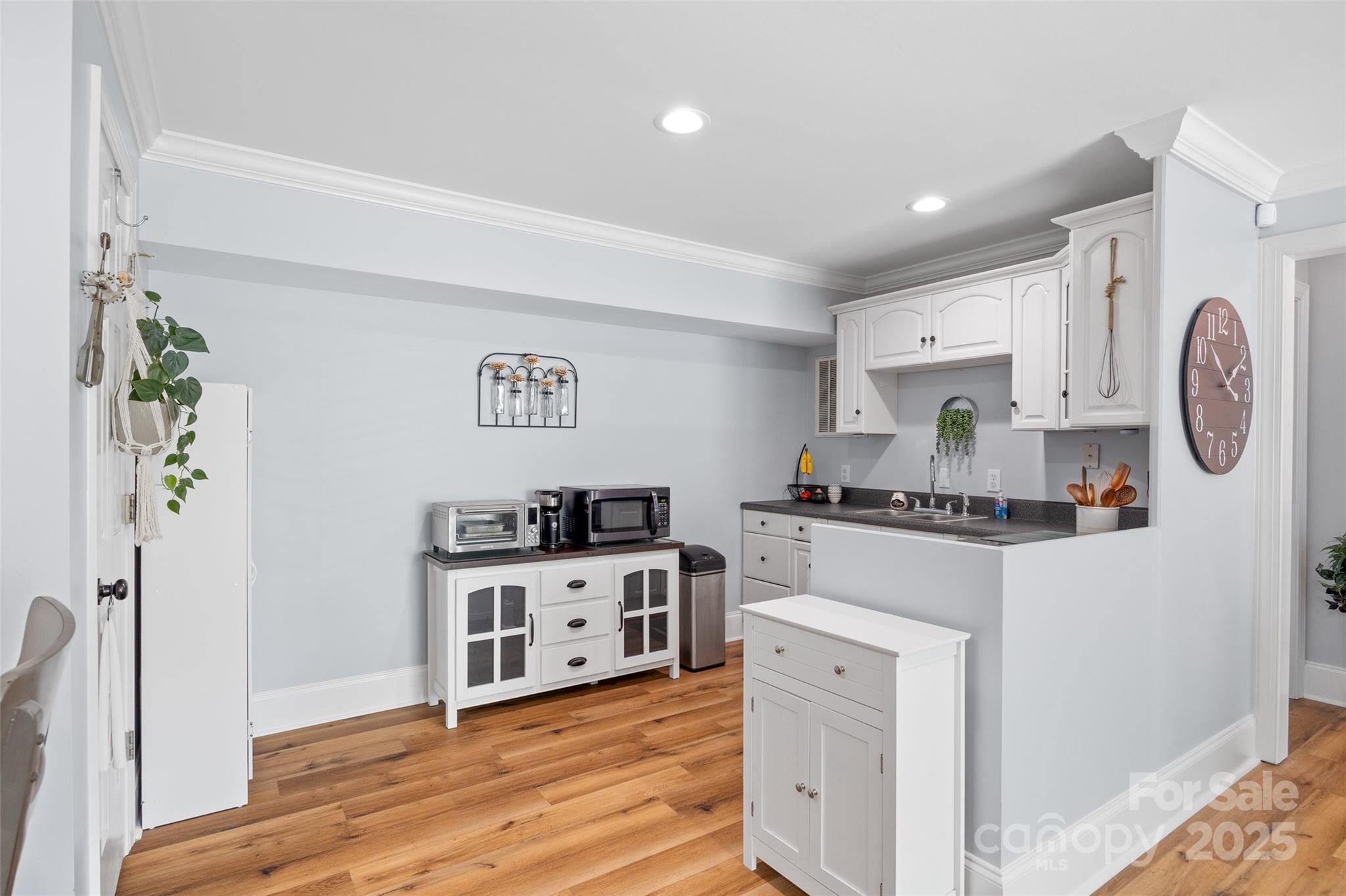 184 Quiet Cove Road Mooresville, NC 28117 - Photo 25 of 45 a kitchen with stainless steel appliances granite countertop a stove and a refrigerator