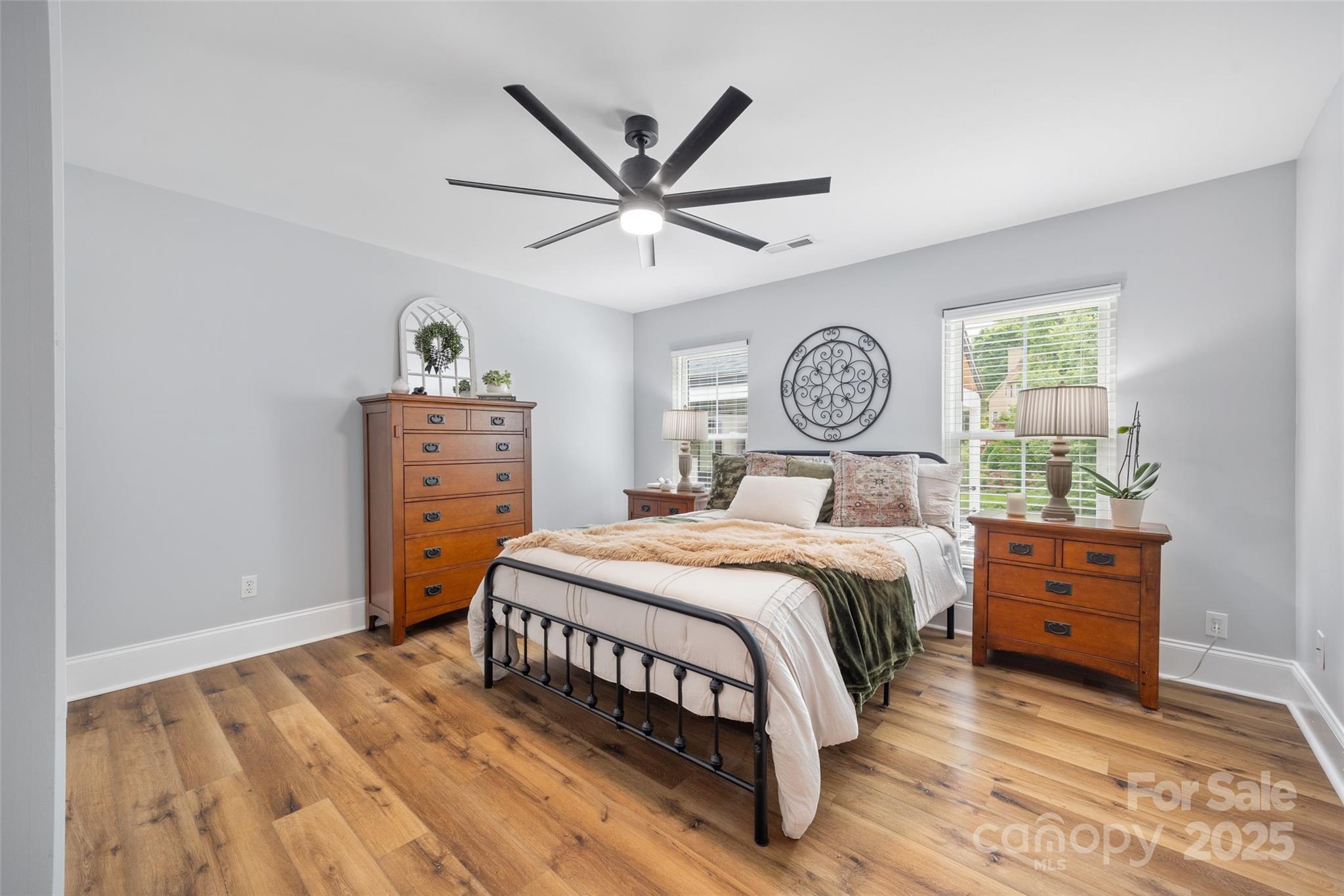 184 Quiet Cove Road Mooresville, NC 28117 - Photo 29 of 45 a bedroom with a bed and window