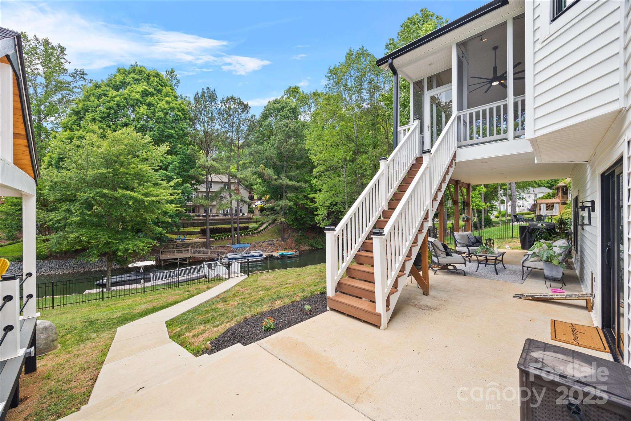 184 Quiet Cove Road Mooresville, NC 28117 - Photo 35 of 45 a view of a swimming pool with a lounge chairs