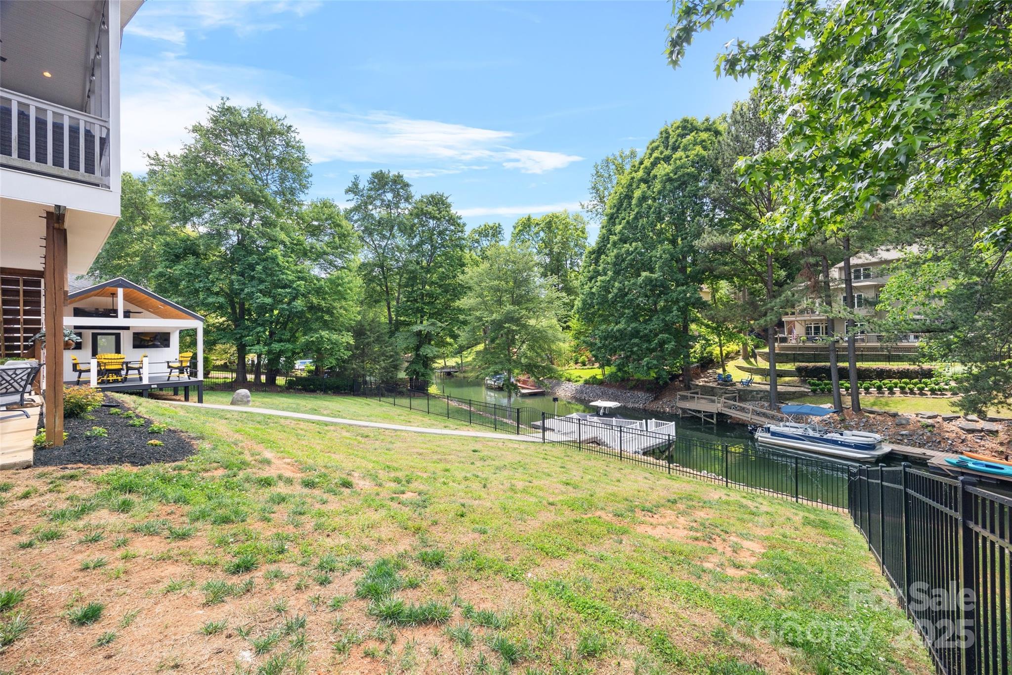 184 Quiet Cove Road Mooresville, NC 28117 - Photo 41 of 45 a view of a house with pool and chairs