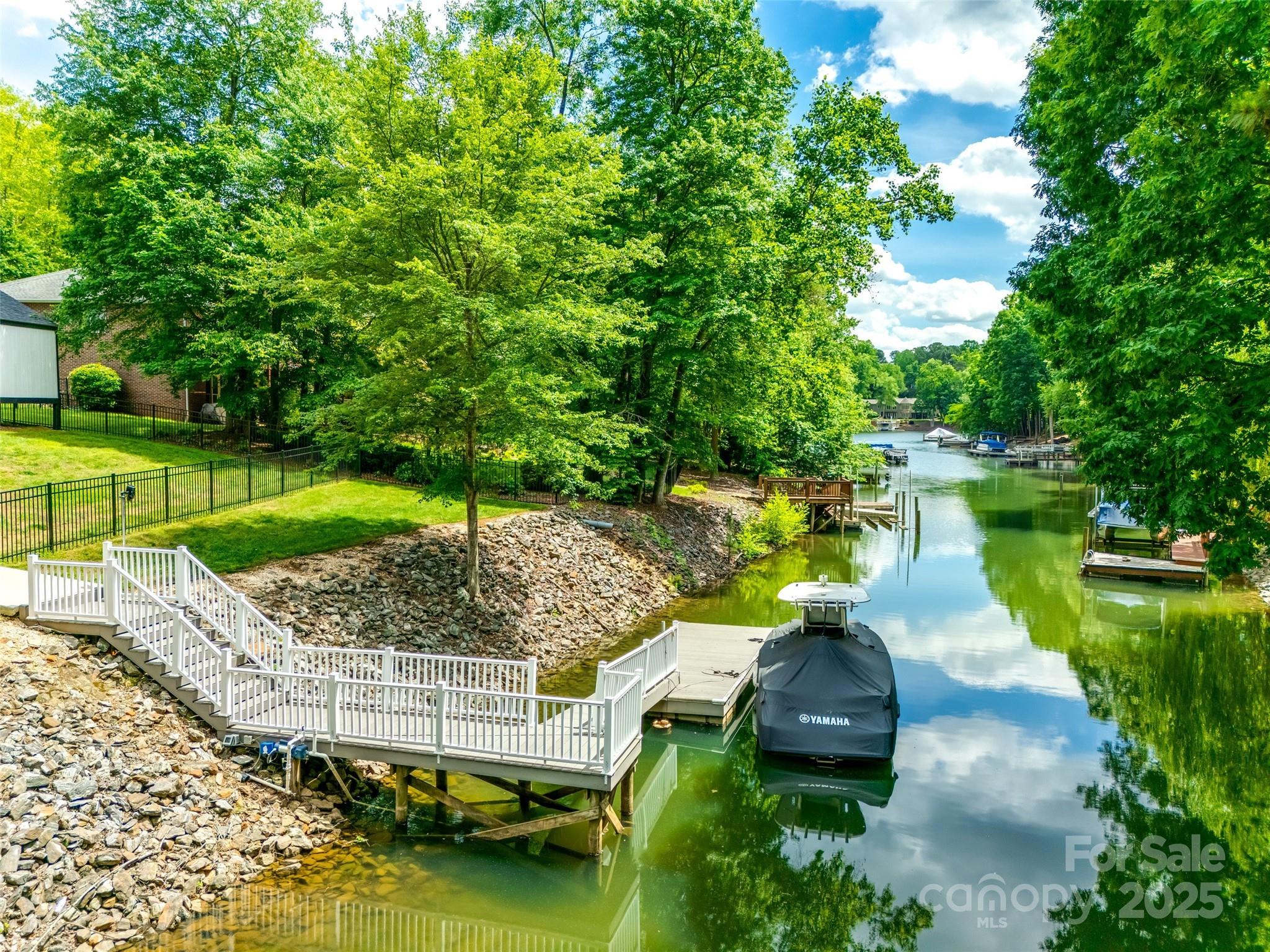 184 Quiet Cove Road Mooresville, NC 28117 - Photo 44 of 45 a garden view with a lake view