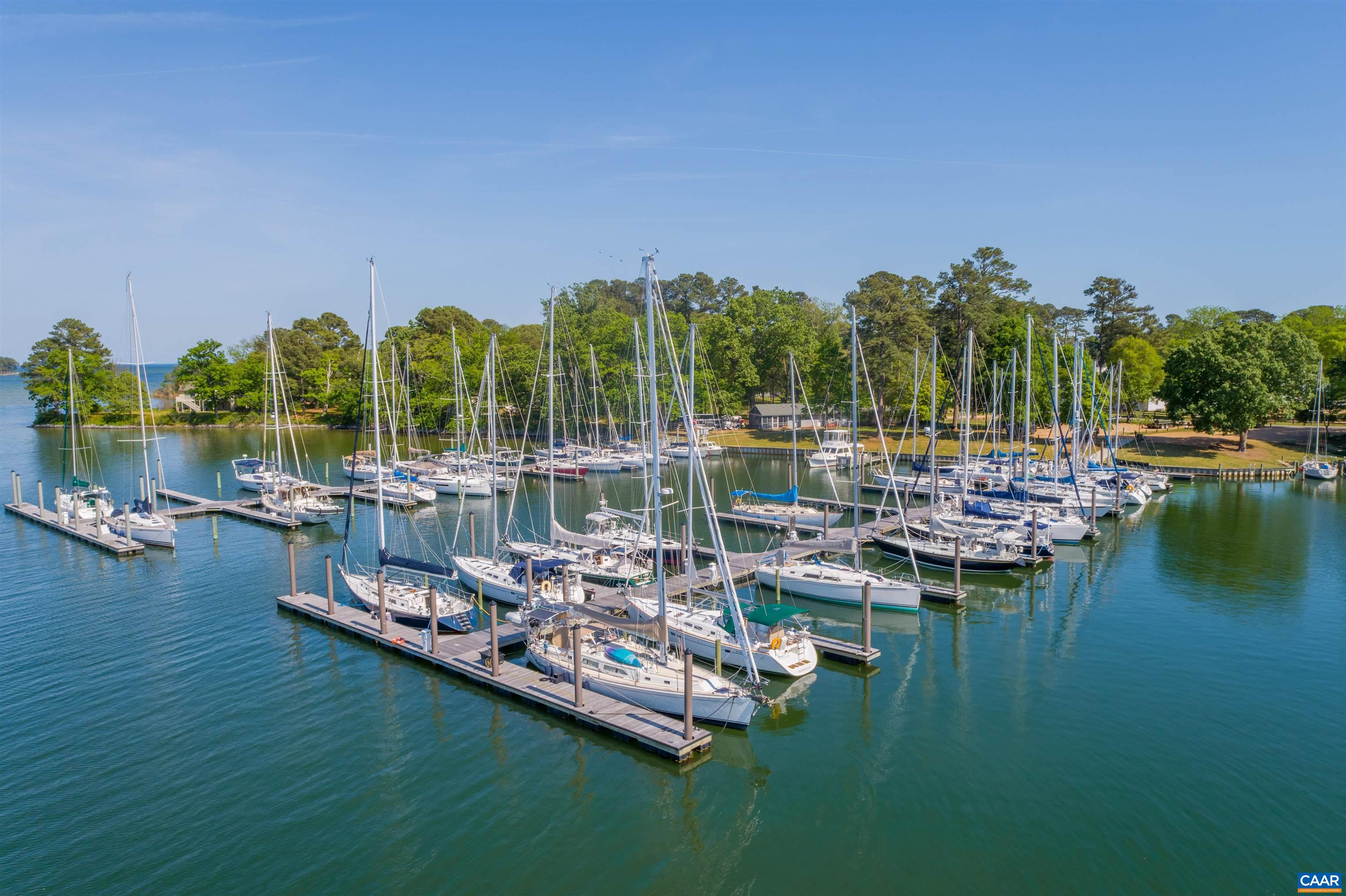 0 Fishing Bay Road Deltaville, VA 23043 - Photo 11 of 13 a view of a lake with chairs