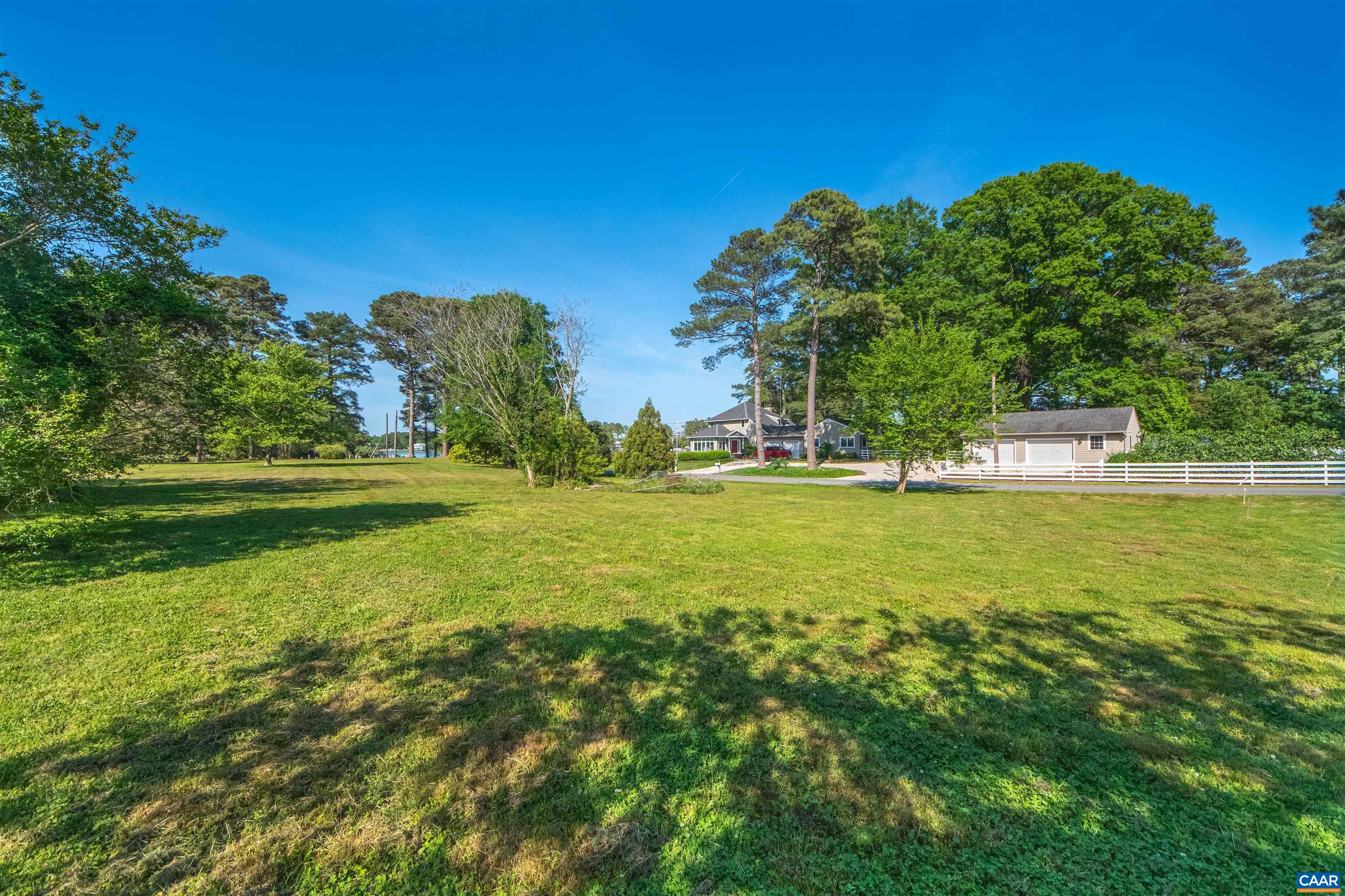 0 Fishing Bay Road Deltaville, VA 23043 - Photo 6 of 13 a view of a green field