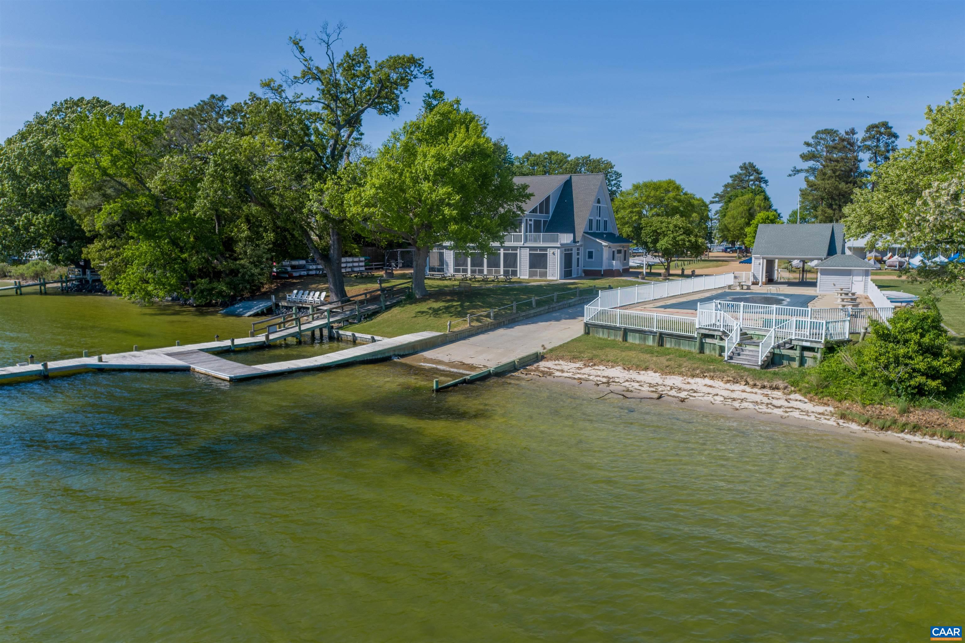0 Fishing Bay Road Deltaville, VA 23043 - Photo 9 of 13 a view of a swimming pool with a yard
