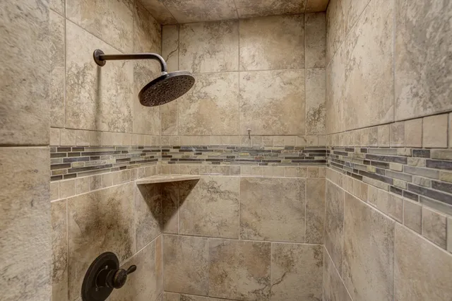 a close view of a shower in bathroom