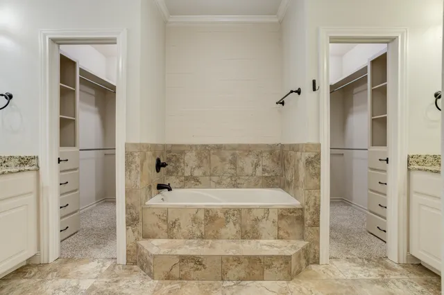 a bathroom with bathtub
