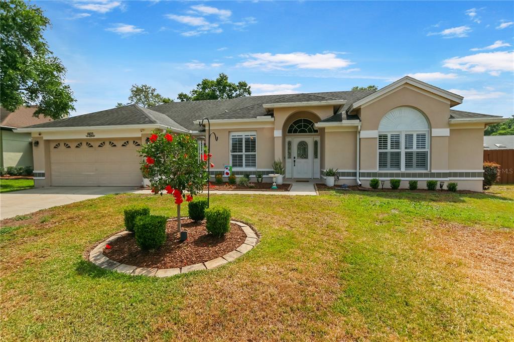 a front view of a house with swimming pool