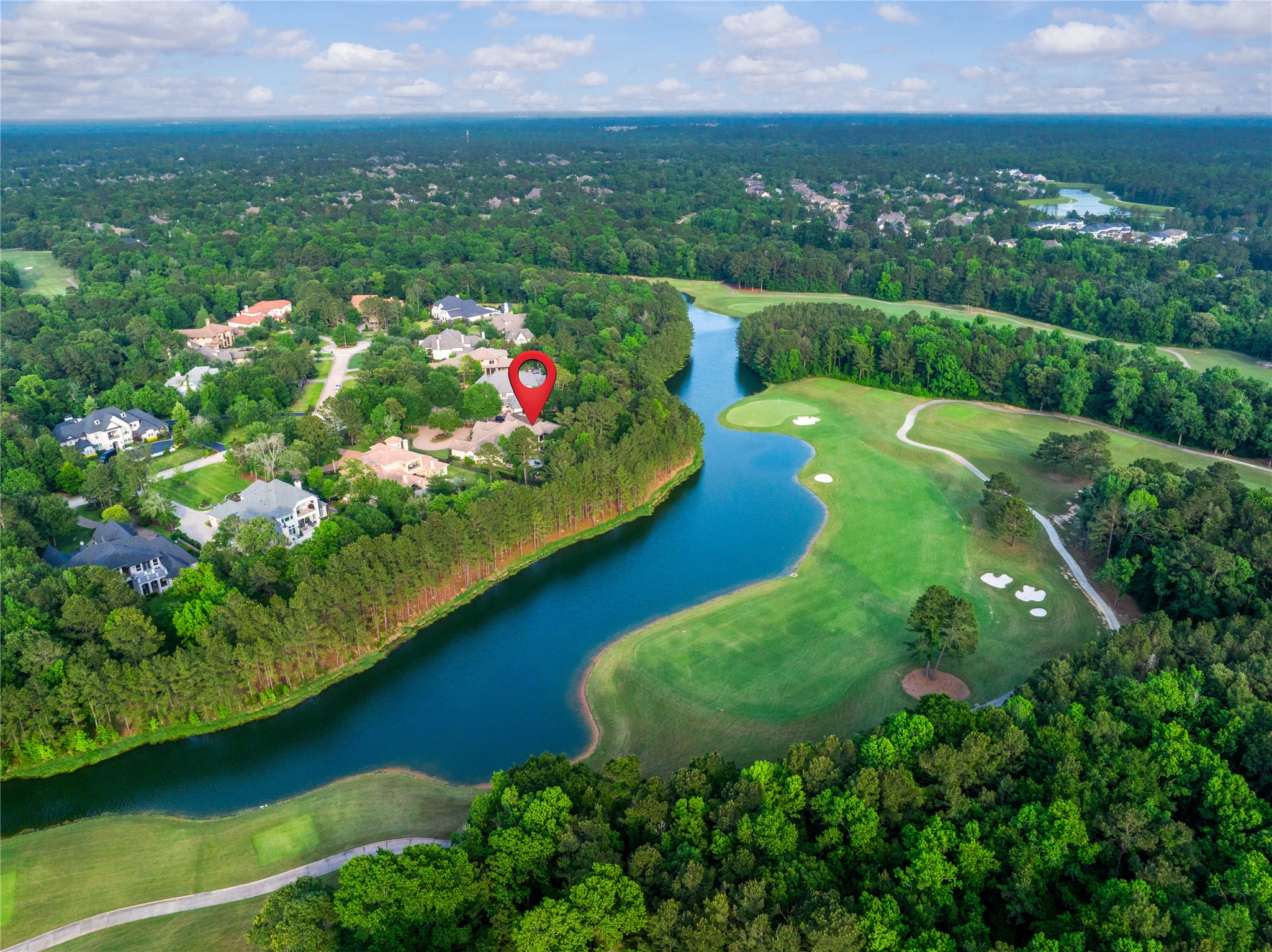 852 Eagle Pointe Montgomery, TX 77316 - Photo 43 of 48 a view of a lake with a city