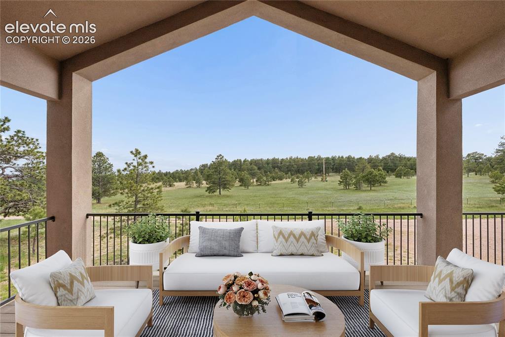 10840 Vollmer Road Colorado Springs, CO 80908 - Photo 11 of 49 a terrace with couches and a table