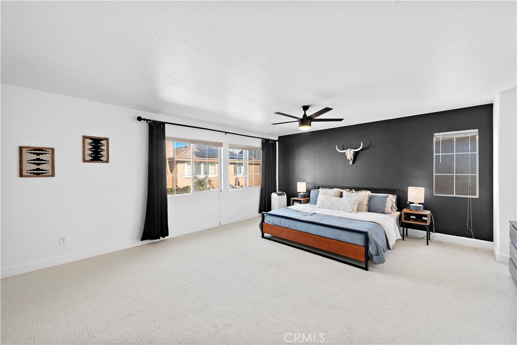 4314 Silver Spring Way Oceanside, CA 92057 - Photo 18 of 47 a spacious bedroom with a bed and a window