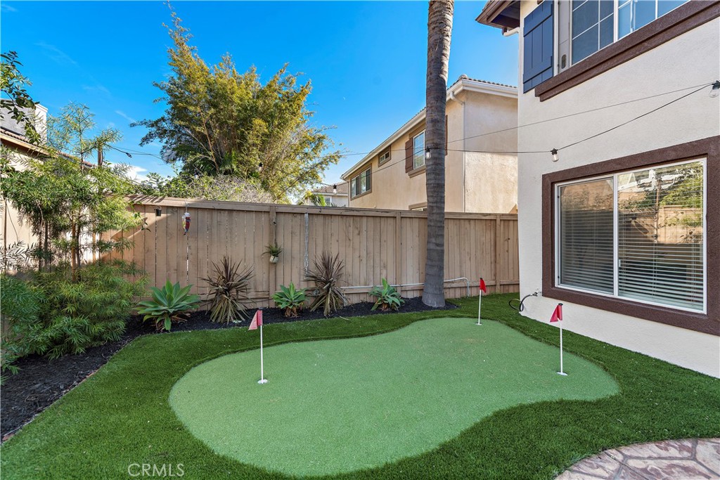 4314 Silver Spring Way Oceanside, CA 92057 - Photo 28 of 47 a house view with a garden space