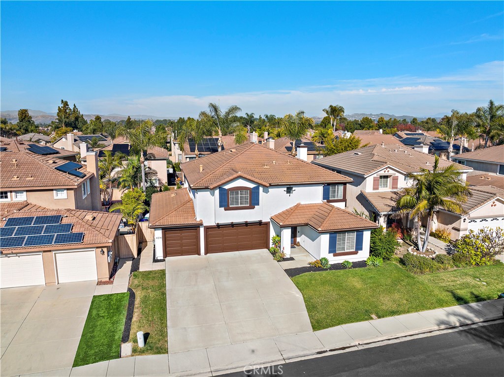 4314 Silver Spring Way Oceanside, CA 92057 - Photo 36 of 47 a view of a city with a building in the background
