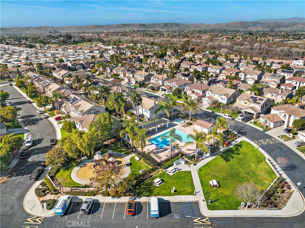 4314 Silver Spring Way Oceanside, CA 92057 - Photo 44 of 47 an aerial view of a house with a yard