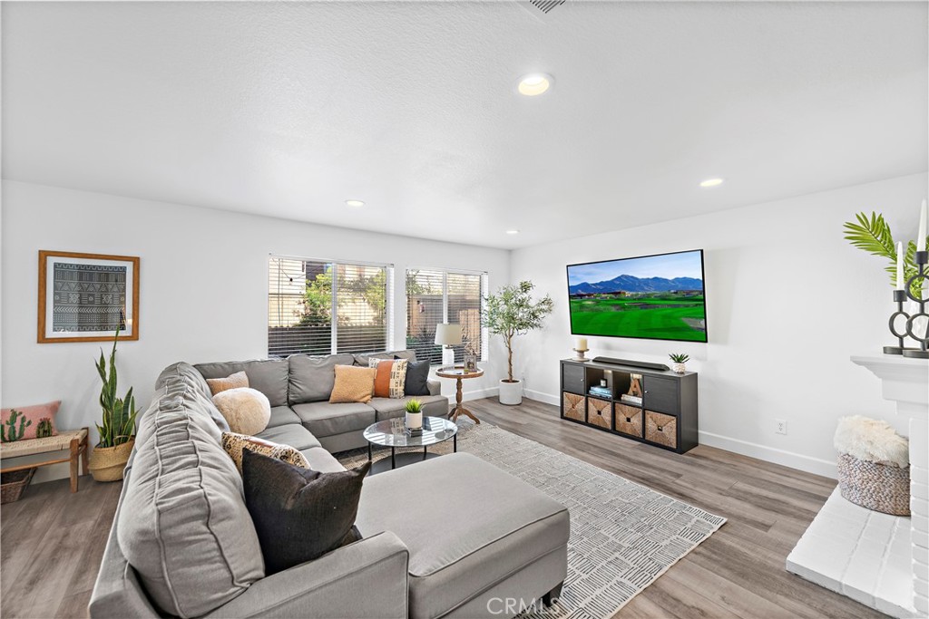 4314 Silver Spring Way Oceanside, CA 92057 - Photo 9 of 47 a living room with furniture and a flat screen tv