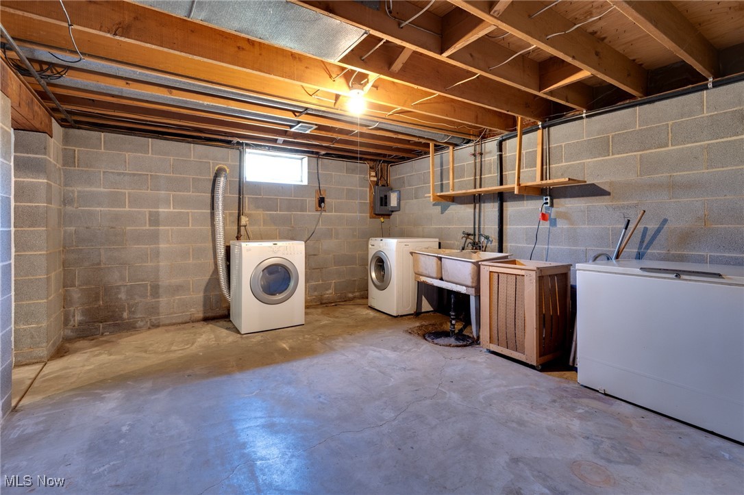 3433 Greenwich Road Barberton, OH 44203 - Photo 26 of 41 Working washer and dryer stay, along with the chest freezer. The wooden box is on wheels and was used to catch laundry as it came through the ceiling from the clothes chute in the hallway upstairs.