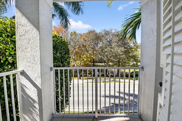 a view of a balcony with plants