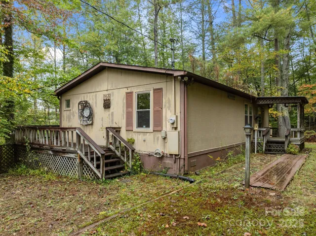 a house with trees in the background