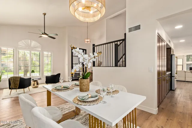 a living room with furniture fireplace and flat screen tv