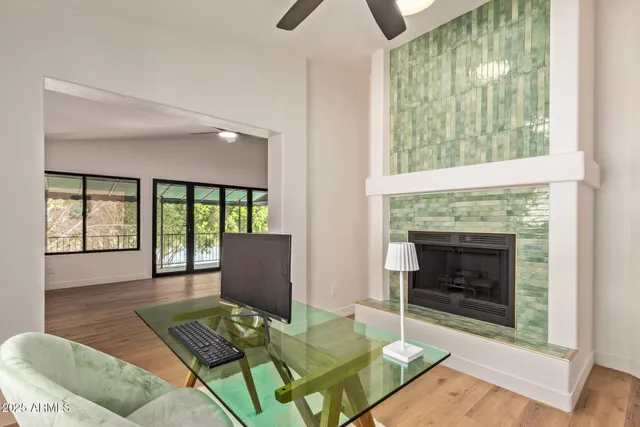 a bathroom with a sink a mirror and a shower