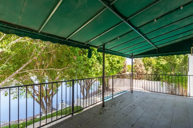 a view of swimming pool with a yard