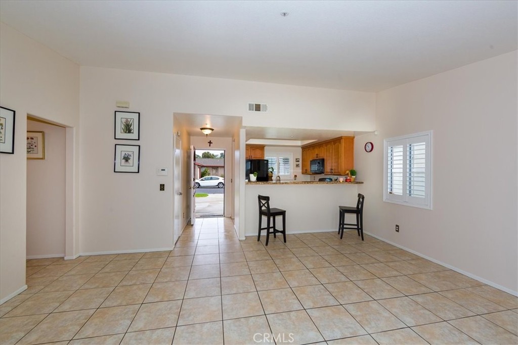 2374 Nash Lane Oxnard, CA 93033 - Photo 5 of 18 a view of a livingroom with furniture and window