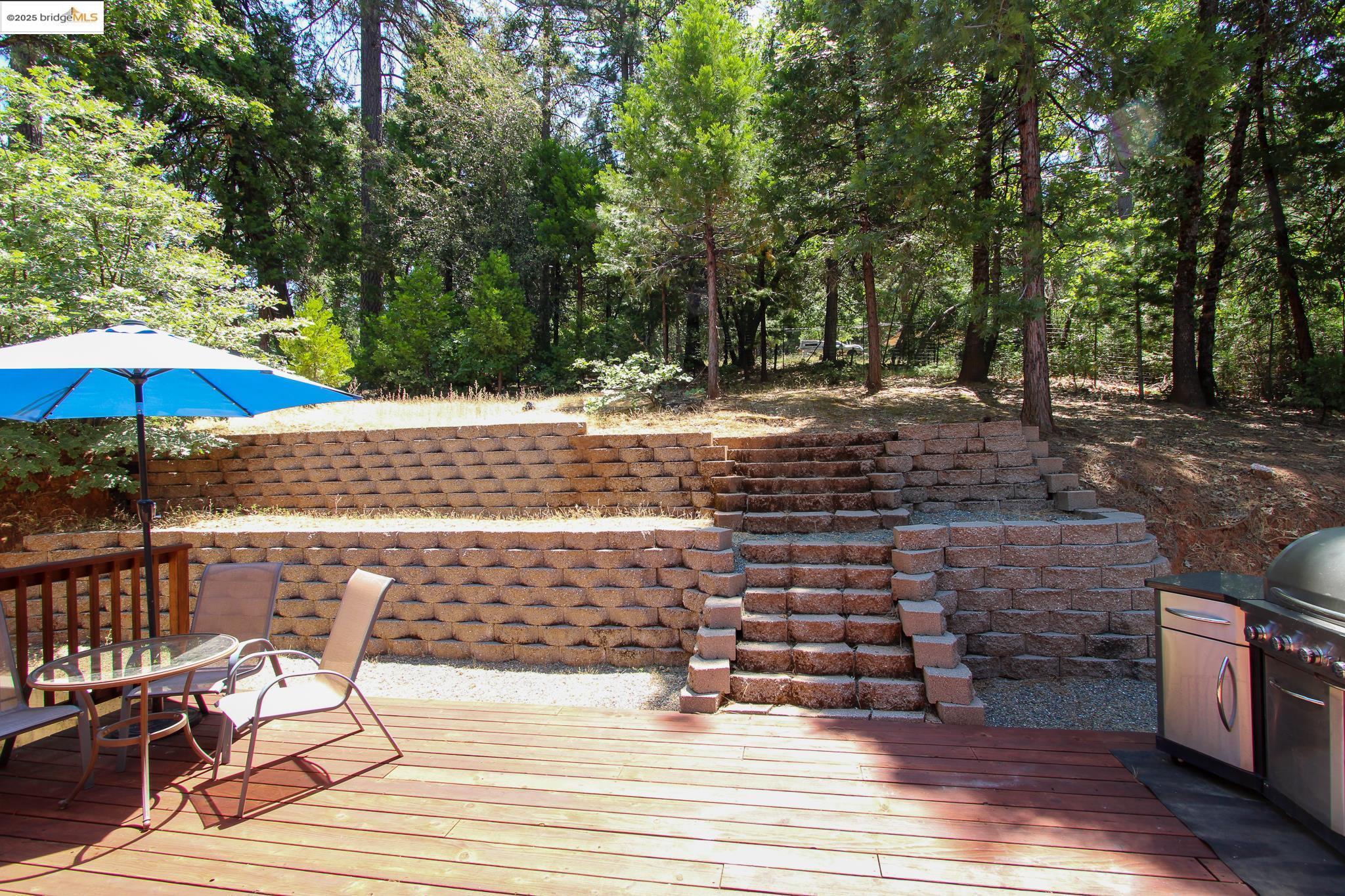 2936 Highway 4 Murphys, CA 95247 - Photo 13 of 41 a view of a chairs and table on the wooden floor
