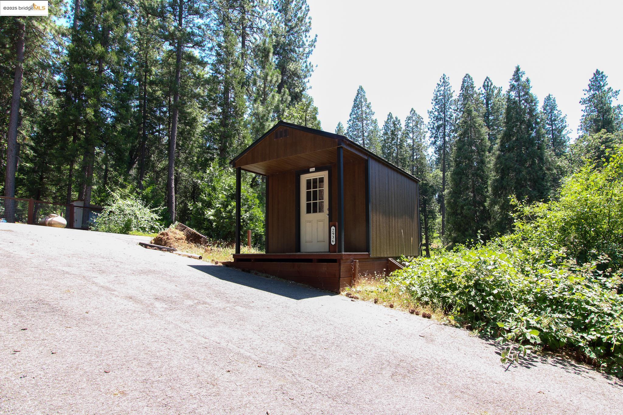 2936 Highway 4 Murphys, CA 95247 - Photo 17 of 41 a front view of a house with a garden