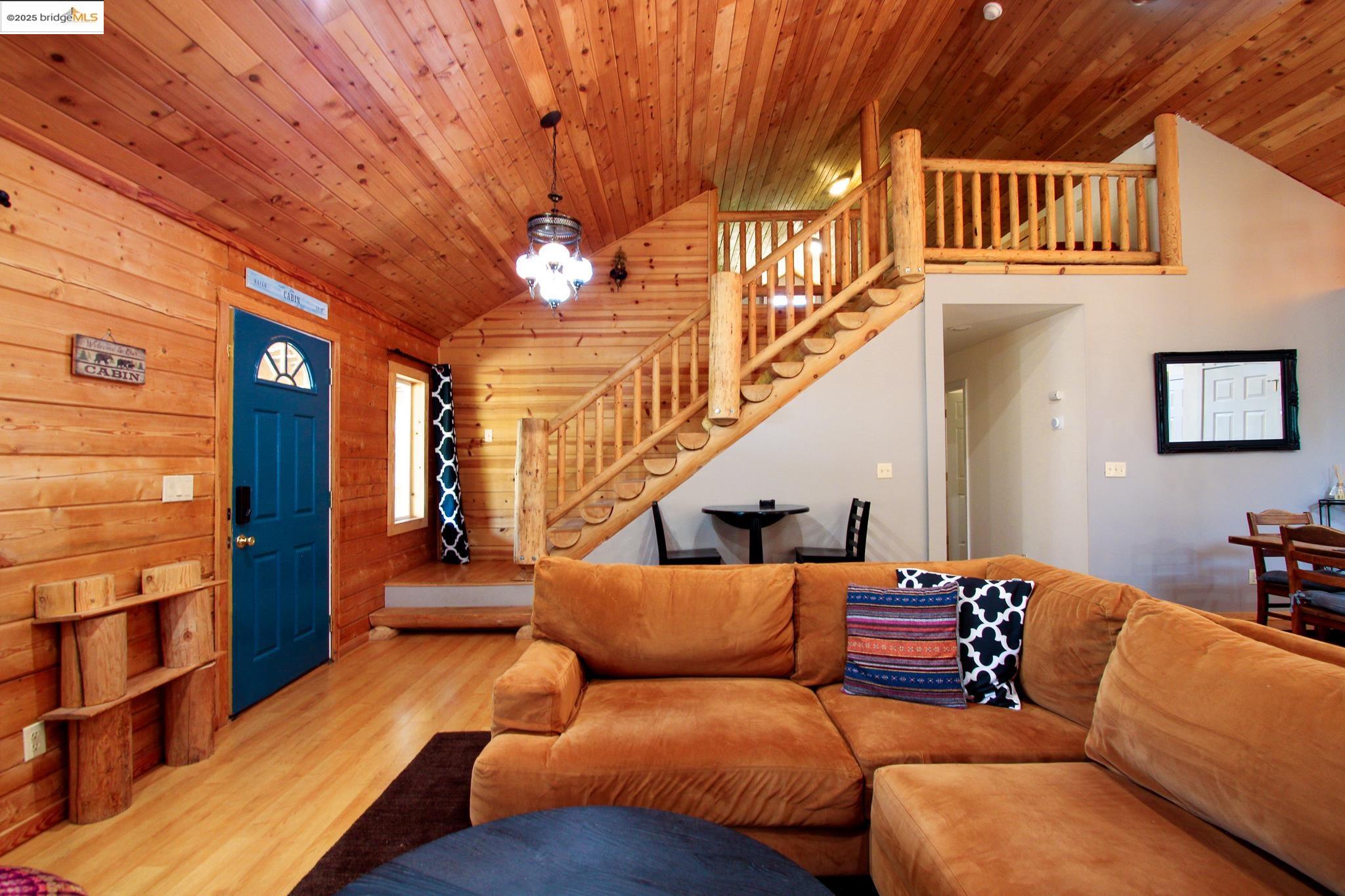 2936 Highway 4 Murphys, CA 95247 - Photo 22 of 41 a living room with furniture a ceiling fan and a rug
