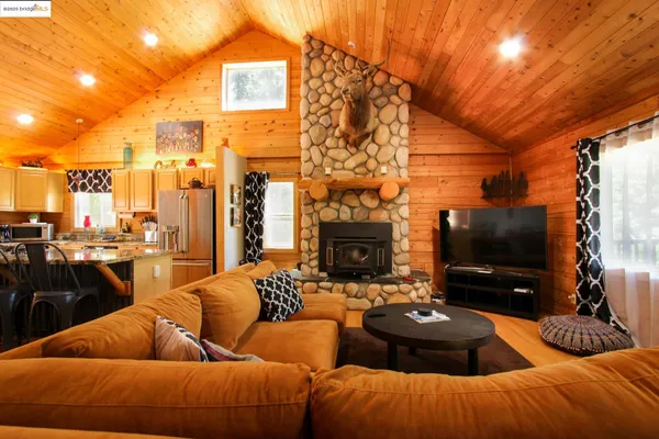 a view of a fireplace with wooden floor